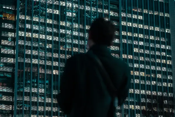 Man Facing Skyscraper 1