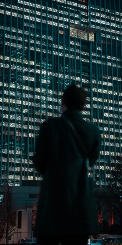 Man Facing Skyscraper 1