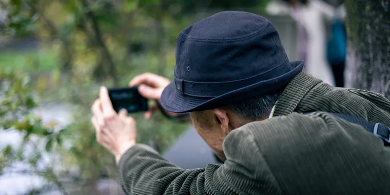 Man Photographing Park 1