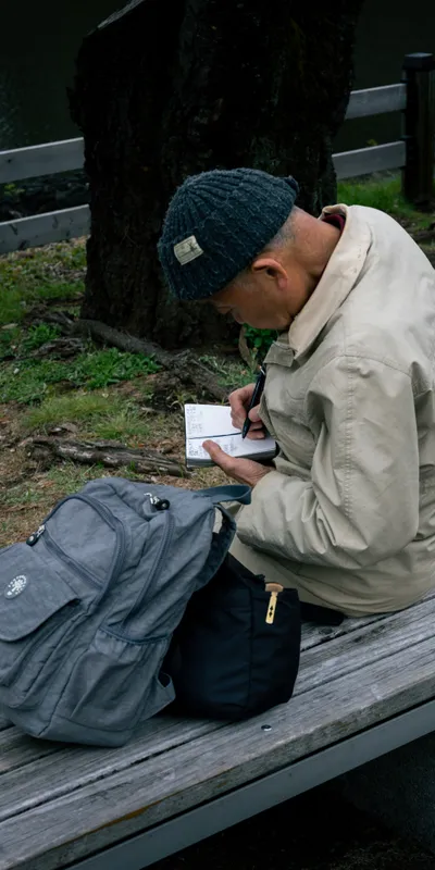 Man Sketching Bench 1