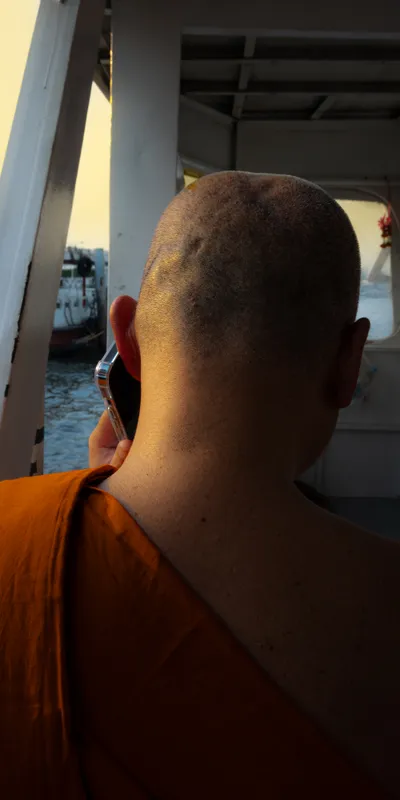 Monk On Ferry Sunset 1