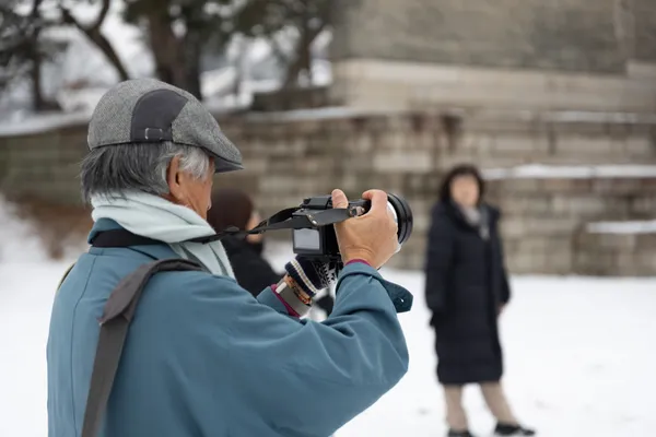 Photographer In Snow 1